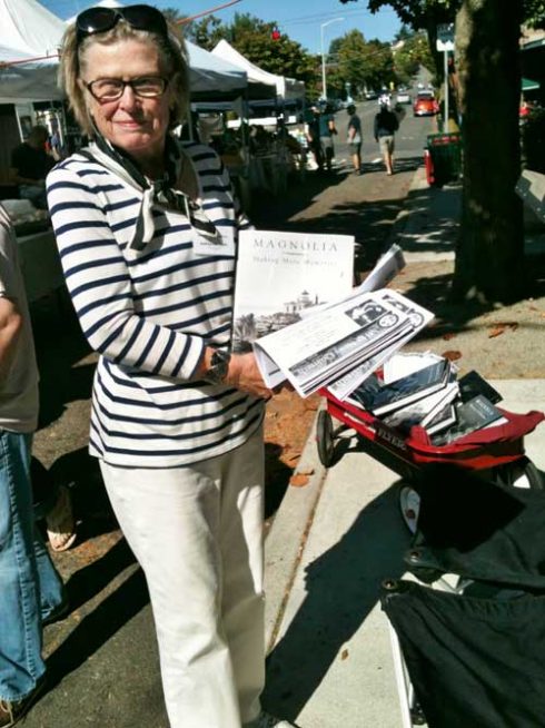 Forbus Hogle participates in the MHS book sales at the Magnolia Farmer's Market in 2014. Photo Monica Wooton.