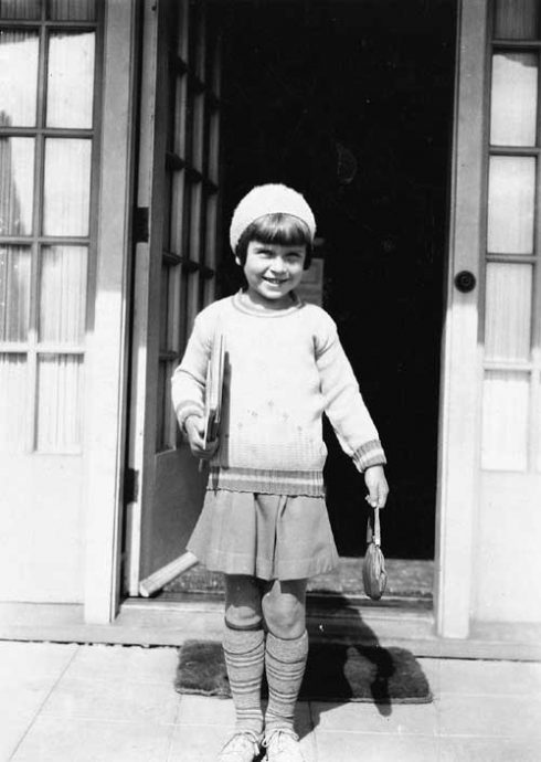 Dale Forbus-Shoemaker is ready for first day of school. No matter their financial situation, her mother always saw to it they had a few new things to wear, making it a special time of year. Living on the Boulevard in the 20s meant classes at Magnolia School. (Courtesy of Forbus Family)